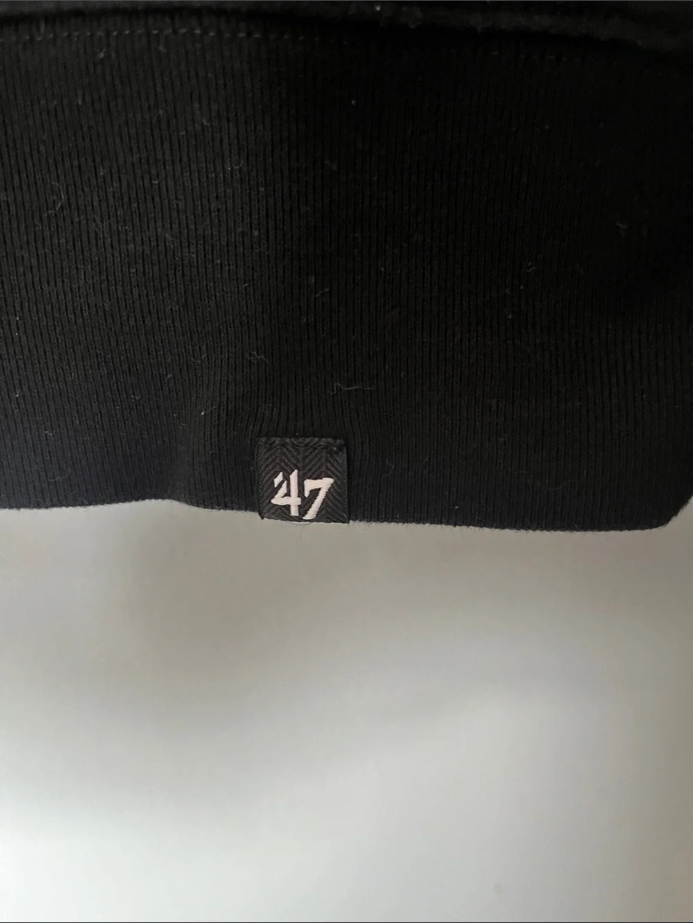 47 Black Crewneck Sweatshirt with Red and Gold Team Appliqué